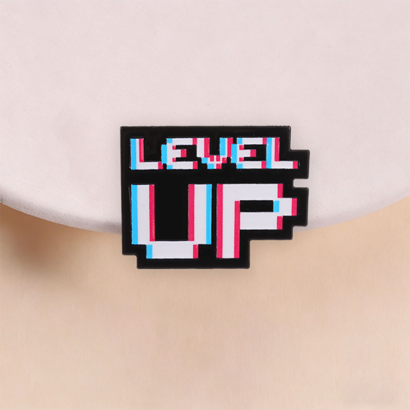 Badge Pixel Glitch Level Up, S - Retro Gaming Accessories avis et prix