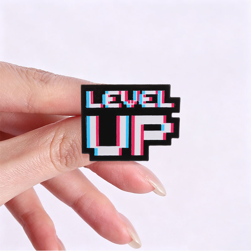 Badge Pixel Glitch Level Up, S - Retro Gaming Accessories avis et prix